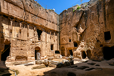 Gumusler ancient monastery with caves on the rock in Turkey
