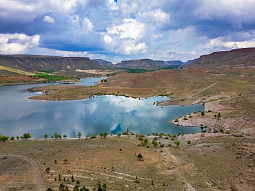 Drone aerial view of Akkoy dam lake with reflection on the water in Cappadocia, Turkey