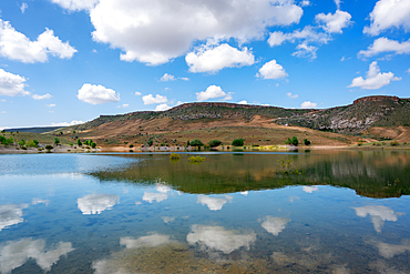 Akkoy dam lake landscape with perfect reflection on the water in Cappadocia, Turkey