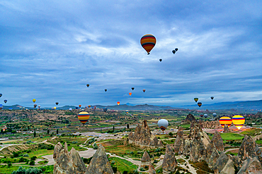Hot air balloons in Cappadocia at sunrise in Turkey