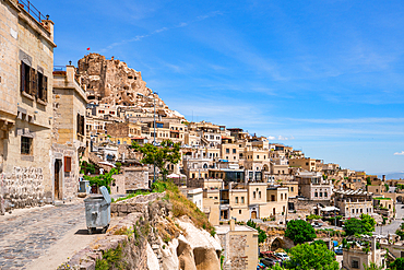 Uchisar town with traditional houses in Cappadocia, Turkey