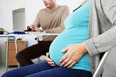 Pregnant woman in consultation