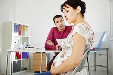 Pregnant woman in consultation