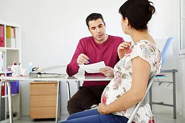 Pregnant woman in consultation