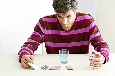 Man taking medication