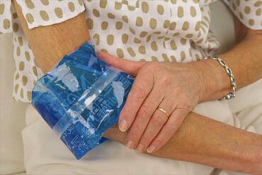 Elbow pain in an elderly person