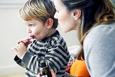 Child taking medication