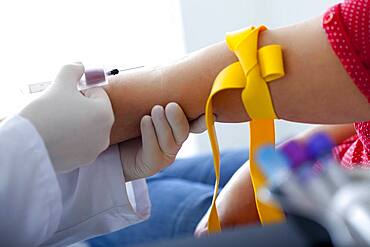 Blood specimen in a woman