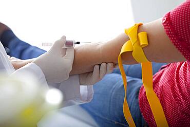 Blood specimen in a woman