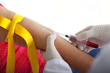 Blood specimen in a woman