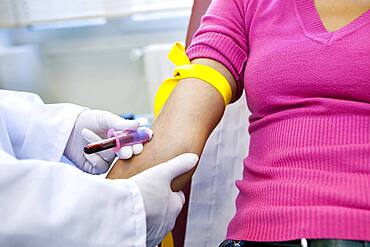 Blood specimen in a woman