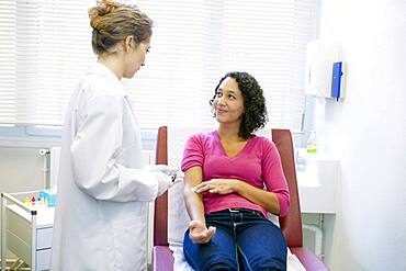 Blood specimen in a woman