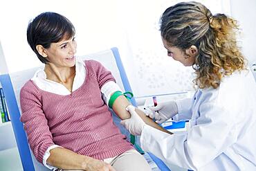 Blood specimen in a woman