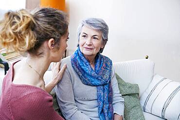 Senior woman with her carer.