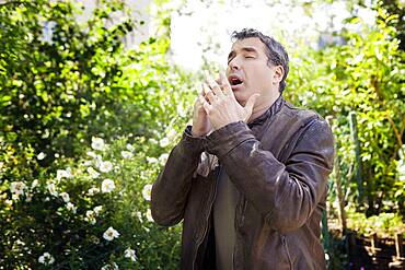Man sneezing.