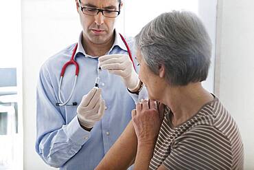 Vaccinating an elderly person