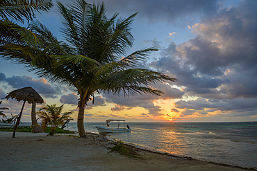 On the playa at sunrise in Mahahual, Costa Maya, Mexico.