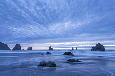 Sea stacks and evening clouds at China Beach, on the Southern Oregon Coast.