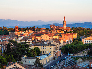 View of Perugia's cityscape from Giardini Carducci viewpoint at sunset, with St. Pietro's Abbey, Perugia, Umbria, Italy, Europe