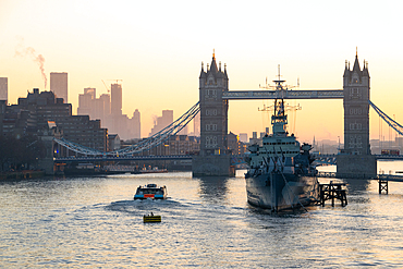 Tower Bridge and HMS Belfast at sunrise, River Thames, London, England, United Kingdom, Europe