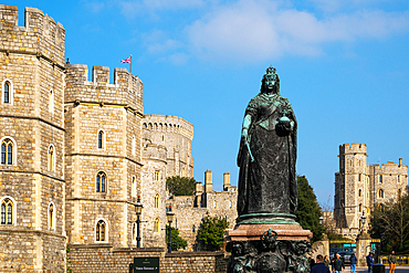 View of Queen Victoria bronze statue on Castle Hill and the castle beyond, Windsor, Berkshire, England, United Kingdom, Europe