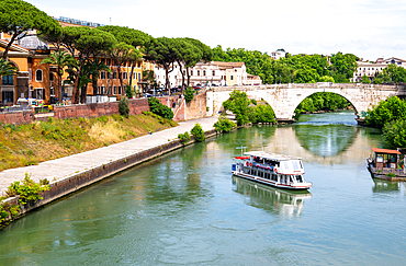 View towards Tiber island (Isola Tiberina) on the left, and Ponte Cestio, Rome, Lazio, Italy