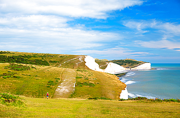 The white cliffs of Seven Sisters, towards Birling Gap and Belle Tout (Belle Toute) Lighthouse, South Downs National Park, East Sussex, England