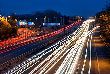 The M56 Motorway at night looking east at junction with the M6, Cheshire, England, United Kingdom, Europe