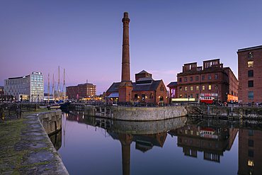 The Pumphouse and buildings of Albert Dock viewed over Canning Dock at twilight, Liverpool Waterfront, Liverpool, Merseyside, England, United Kingdom, Europe