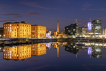 The Albert Dock, Pumphouse and Liverpool Waterfront reflected in Salthouse Dock at night, Liverpool, Merseyside, England, United Kingdom, Europe