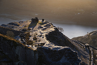 Remains of Mine working Building and Spoil Tips at Dinorwig Slate Quarry backed by Llyn Peris, Eryri or Snowdonia National Park, North Wales, UK