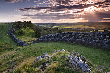 UNESCO World Heritage Site Hadrians Wall looking west from Walltown at sunset, Hadrians Wall, near Haltwhistle, Northumberland National Park, Northumberland, England, UK