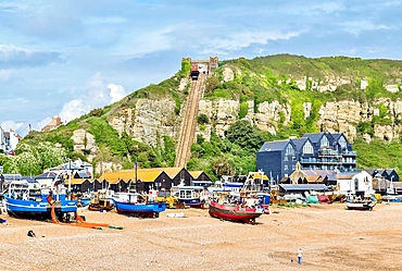 Fishing boats on The Stade (the fishermen's beach) with East Hill Cliff Railway behind, Hastings, East Sussex, England, United Kingdom, Europe