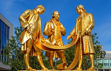 The statue of Matthew Boulton, James Watt and William Murdoch known as The Golden Boys, Centenary Square, Birmingham, West Midlands, England, United Kingdom, Europe