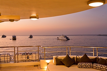 Evening on a moored tour boat in the Galapagos Islands, UNESCO World Heritage Site, Ecuador, South America