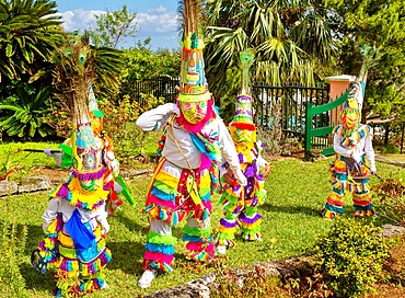 Gombey dancers, traditional performers, in troupes of 10 to 20, of a blend of Native American, Caribbean and British culture, dancing to a powerful drum beat, Bermuda, Atlantic, North America