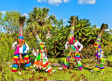 Gombey dancers, traditional performers, in troupes of 10 to 20, of a blend of Native American, Caribbean and British culture, dancing to a powerful drum beat, Bermuda, Atlantic, North America