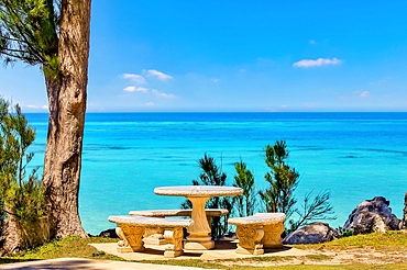 Picnic table next to the ocean, Somerset Parish, Bermuda.