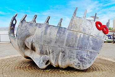 Merchant Seafarers Monument at Cardiff Bay, Wales. It was completed in 1996 and stands close to the Welsh Senedd (Parliament) by the Cardiff Bay waterfront.