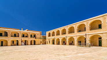 The Piazza d'Armi (Parade Ground) at Fort St Elmo, Valletta, Malta. There are barracks on three sides of the square which were built in 1730 by the Order of St John.