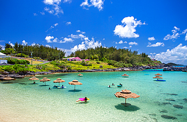 Tobacco Bay, St George's, Bermuda, is a popular tourist attraction for its beach and snorkeling. It was the scene of Bermuda's Gunpowder Plot in 1775 when locals stole British gunpowder and sent it to America to arm those seeking independence.