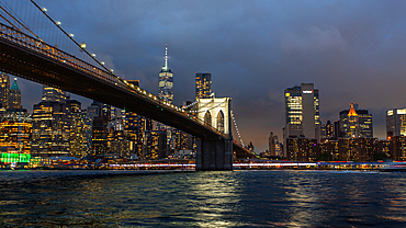 Brooklyn Bridge, New York City, spanning the East River between Manhattan and Brooklyn. When built in 1883 it was the longest suspension bridge in the world and carried railway lines until 1950.