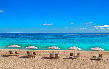 Loungers and umbrellas on Pink Beach West, Smiths, Bermuda, Atlantic, Central America