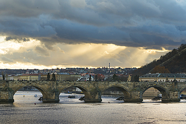 Charles Bridge against dramatic sky, UNESCO World Heritage Site, Prague, Bohemia, Czech Republic (Czechia), Europe