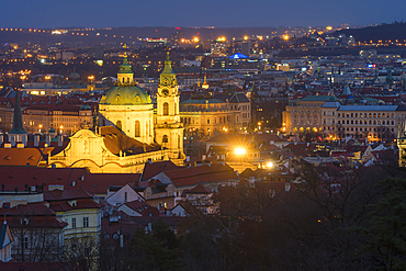 Illuminated St. Nicholas Church at night, Mala Stranar, UNESCO World Heritage Site, Prague, Bohemia, Czech Republic (Czechia), Europe