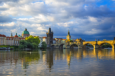 Charles Bridge, OId Town Bridge Tower and dome of St. Francis of Assisi Church by Vltava River, UNESCO World Heritage Site, Prague, Czechia, Europe