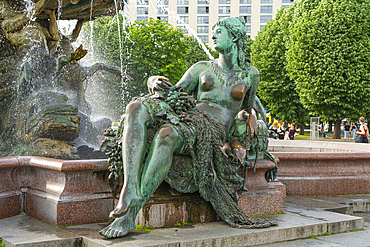 Sculpture of woman at Neptune Fountain designed by Reinhold Begas, Mitte, Berlin, Germany, Europe