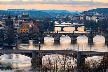 Bridges over Vltava river against sky seen from Letna park at dusk, Prague, Bohemia, Czech Republic