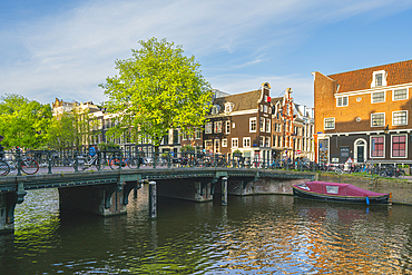 Bridge over Keizersgracht canal at sunset, Amsterdam, The Netherlands