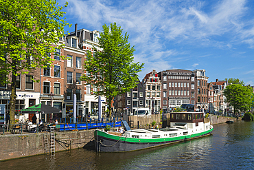 Moored boat on Prinsengracht canal, Amsterdam, The Netherlands